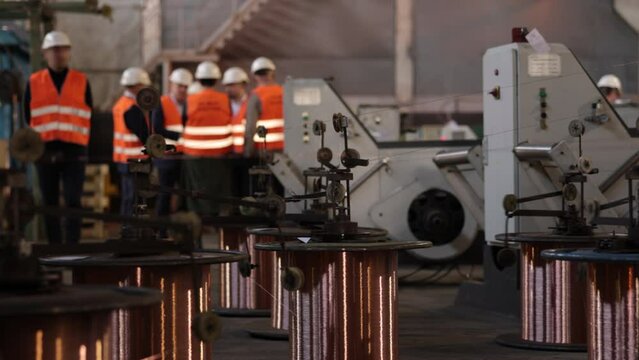 copper cable, Large bobbin, Wire coating. Copper wire and cable production in coils in an industrial plant where copper is produced, mittal steel's industrial plant for cable production
