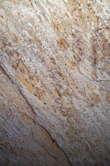 Extreme Closeup of a Yellow, White, and Tan  Marble Block.