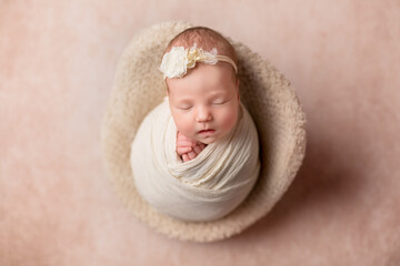 beautiful born girl sleeps. newborn baby