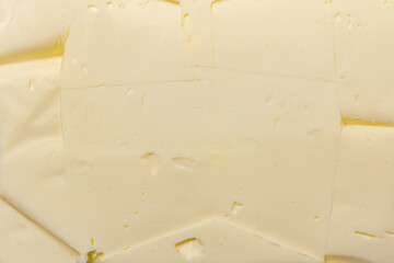Obraz na płótnie Canvas Close up photo texture of butter surface.