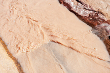 Obraz premium Abstract patterns in a desert runoff stream