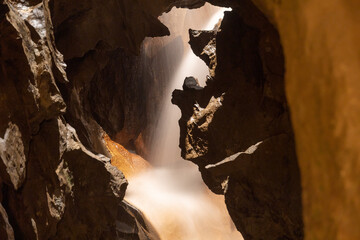 Majestic waterfall inside the Saint Beatus caves in Switzerland