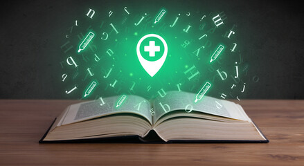 Open medical book with health icons above