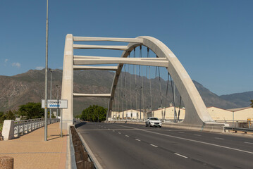 Ashton, Western Cape, South Africa. 2023. Arched bridge supporting a four laned carriagway over the Cogmanskloof river in Ashton, South Africa.