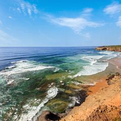 Summer Atlantic ocean coast landscape and Monte Clerigo beach (Aljezur, Algarve, Portugal).