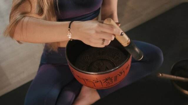 Tibetan singing bowl music meditation by hand rotation with healing vibration.