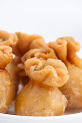 Kalash Gujiya Or Potli Gujia Meetha Also Called Pirukiya, Pirukia, Pedakiya, Karanji, Basundi, Gughra MIthai Is Made Of Suji Ghee Filled With Mawa Khoya Chasni Mava Khoa On Deepawali, Teez, Holi, Teej
