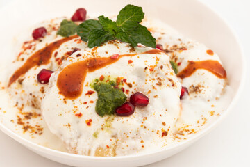 Dahi Bhalla Also Called Dahi Vada, Dahi Bhalle Or Dahi Bada Are Fried Lentil Dumplings Made Of Soaked Split Urad Dal And Moong Daal Topped With Whip Curd, Masala Powder, Meethi, Hari Pudina Chutney