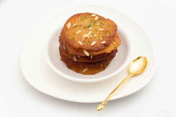 Juicy Sugary Pancakes Sweets Also Called Malpua, Pooa Or Pua Are Traditional Indian Dessert Mithai Drenched, Dunked, Soaked Or Dip In Sugar Syrup Cheeni Ki Chasni. Enjoyed On Holi, Navratri and Diwali