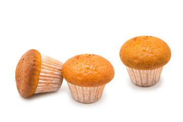 Freshly baked muffins isolated on white background.	
