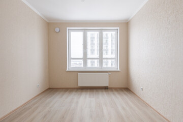 Empty gray room ready for people to move in