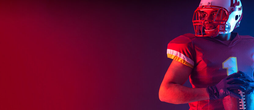 American football player. Download high resolution photo for sports design. Horizontal banner in neon colors. Mockup for betting advertisement.