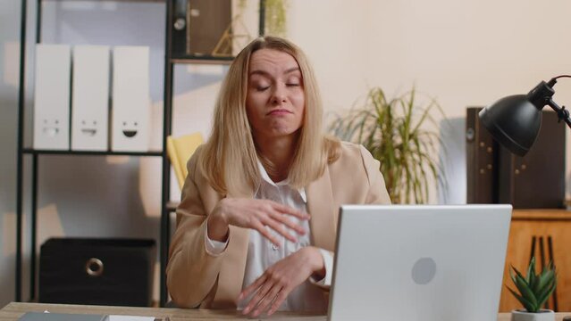 I dont know what to say. Confused business woman working on laptop at office workplace. Freelancer feeling embarrassed about ambiguous question, having doubts, no answer idea, being clueless uncertain