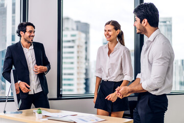 Group of business meeting and discussing strategy with startup project analysis finance process.Success business people plan and brainstorm marketing idea with computer and document in office.Teamwork