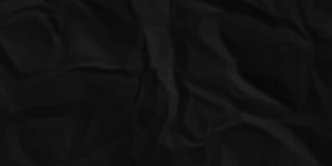 Obraz premium Dark Black facbric paper backdrop crumpled texture. dark black textured crumpled black paper background. panorama black paper texture background, crumpled pattern.