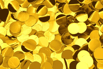 Shiny golden confetti as background, top view