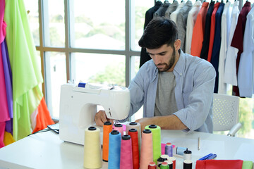 Young designer with his design, Fashion design concept.