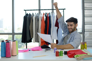 Young designer with his design, Fashion design concept.
