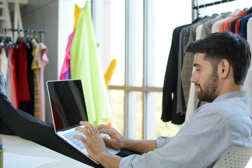 Young designer with his design, Fashion design concept.