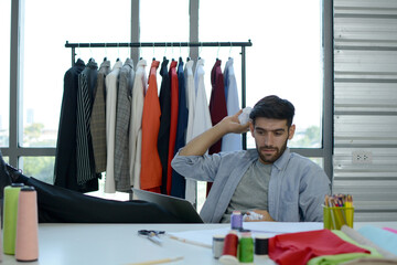 Young designer with his design, Fashion design concept.