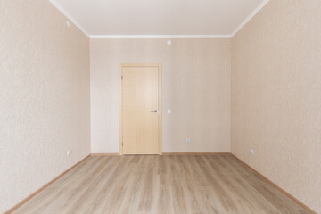 Empty gray room ready for people to move in