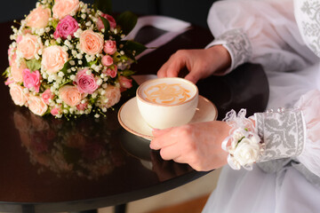 bride and groom holding wedding bouquet