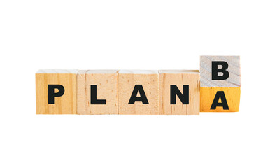 Plan A flip to Plan B, word on wood block. Isolated, transparent background.