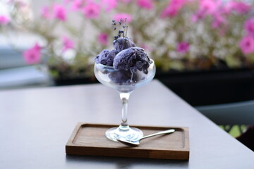 lavender ice cream in a glass cup