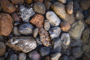 Rocky shapes on the beach. textures and patterns generated on the stones of the Ibiza.