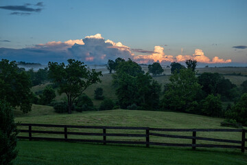 Misty countryside at sunset