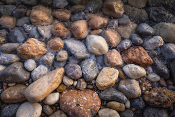 Rocky shapes on the beach. textures and patterns generated on the stones of the Ibiza.