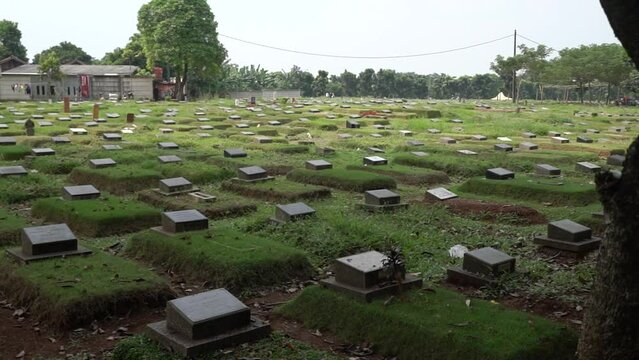 One of the public cemeteries in Pondok Gede Jakarta, the majority of Muslims in Indonesia will visit the cemetery before the fasting month of Ramadan arrives.