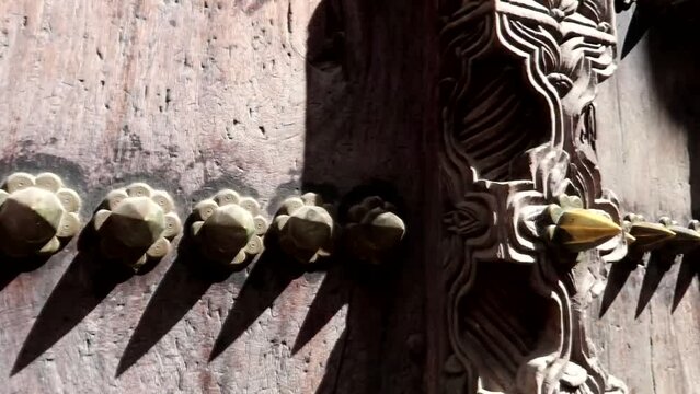 Details of a typical Arabic door located in Mji Mkongwe neighbourhood in old Stone Town, Zanzibar