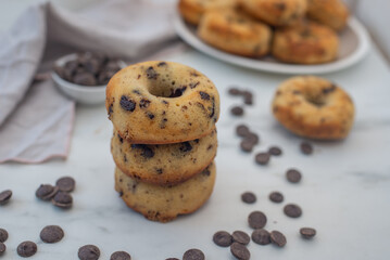 sweet home made chocolate chip donuts on a table