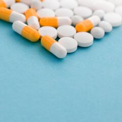Heap of colorful pills, medical background, copys pace.