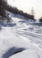 Winter road in the highlands, morning dawn, walking in the fresh air.