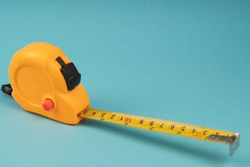 Yellow construction tape on a blue background