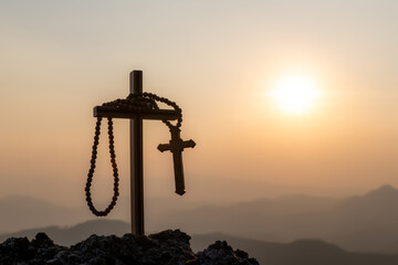The crucifixion of Jesus Christ at the sunrise - Silhouette Three Crosses On Hill
