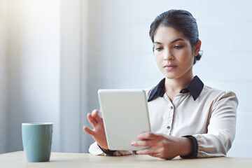 Business woman, tablet and thinking in office with vision, internet research and strategy for goals. Young executive, computer and brainstorming for ideas, focus and website management in workplace