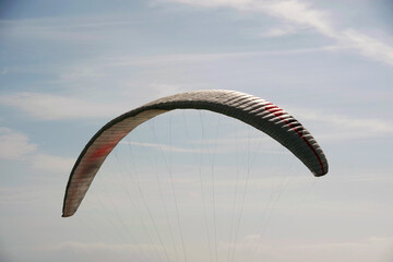 Paraglider up in the sky