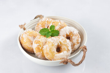 Kuih Keria or Kuih Gelang is Malaysian Traditional Snack made from Fried Sweet Potatoes, Coated with sugar.