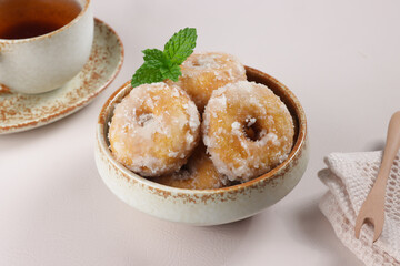 Kuih Keria or Kuih Gelang is Malaysian Traditional Snack made from Fried Sweet Potatoes, Coated with sugar.