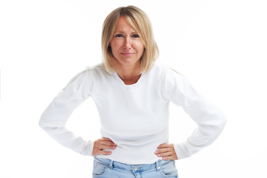 Picture of angry blonde woman isolated over white background
