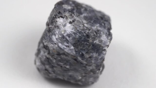 Natural mineral stone cordierite gemstone, geological collection raw crystal
