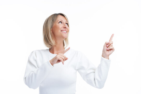 Picture of blonde woman isolated over white background showing empty space