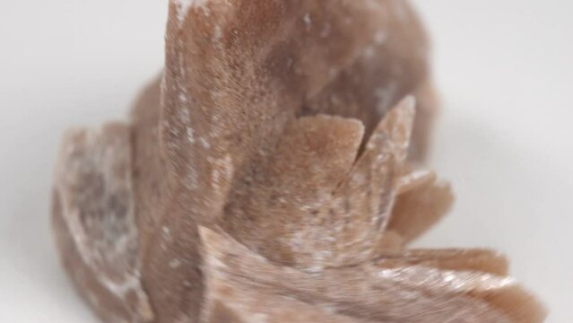 Desert rose. Rock composed of gypsum close up, crystals that resemble the shape of a rose.