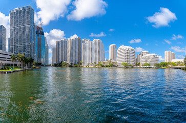 Obraz premium Miami Beach, Florida- Modern multi-storey buildings at intracoastal waterway in Biscayne Bay. Multi-storey coastline buildings against the sky.
