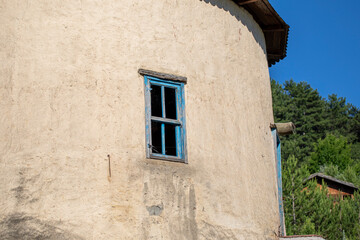 Fototapeta na wymiar Old home with blue window background