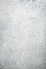 Gray painted concrete texture or background with grain elements. Image with place for text. Template for design