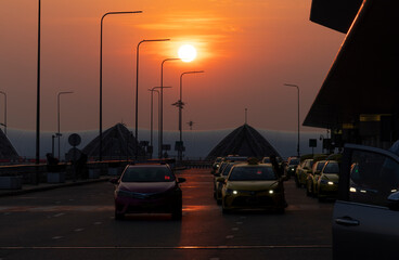 Airport in sunrise light - with Taxi line - Bangkok in Thailand